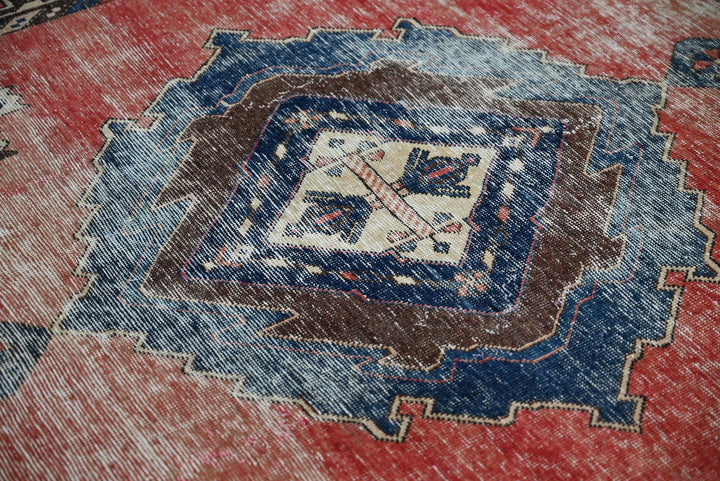 red Medium rug 4' 9" x 6' 10"