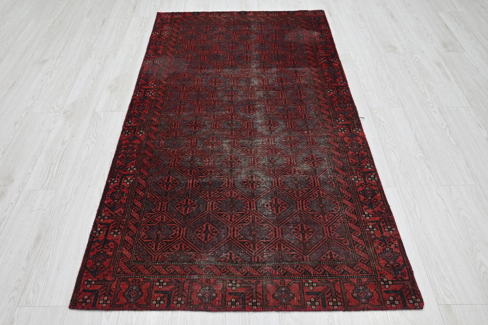 red Accent rug 3' 3" x 6' 2"