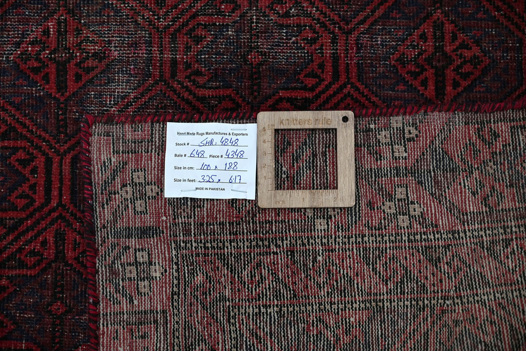 red Accent rug 3' 3" x 6' 2"