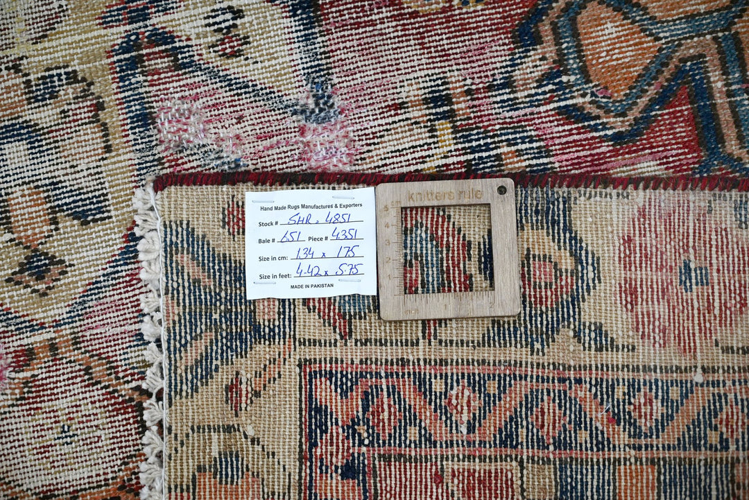 red Accent rug 4' 5" x 5' 9"