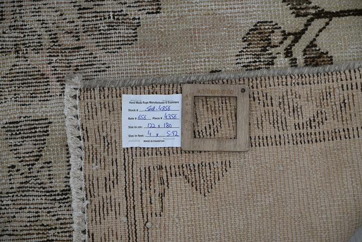 brown Accent rug 4' 0" x 5' 11"