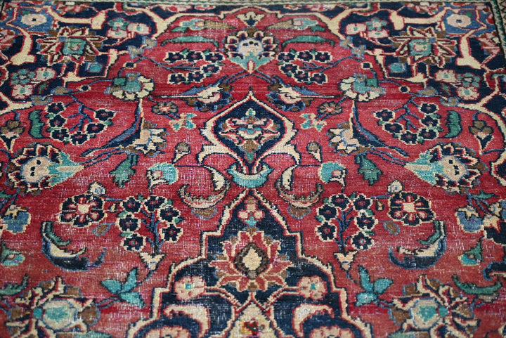 red Accent rug 4' 0" x 6' 2"