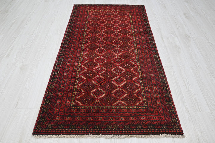 red Accent rug 3' 1" x 6' 0"