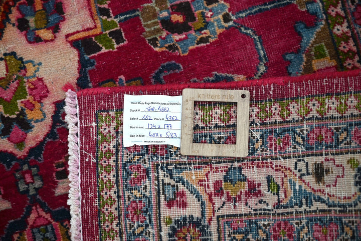 red Accent rug 4' 1" x 5' 10"