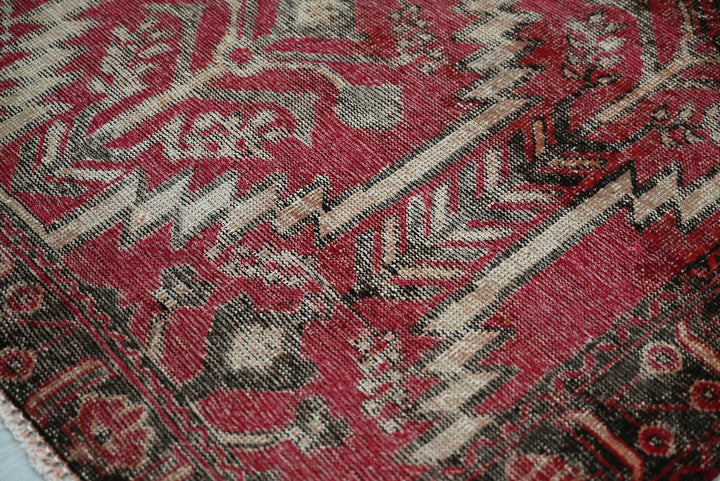 red Accent rug 3' 10" x 6' 4"