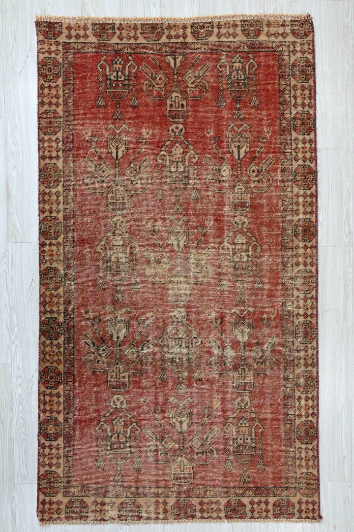 red Accent rug 3' 7" x 3' 10"