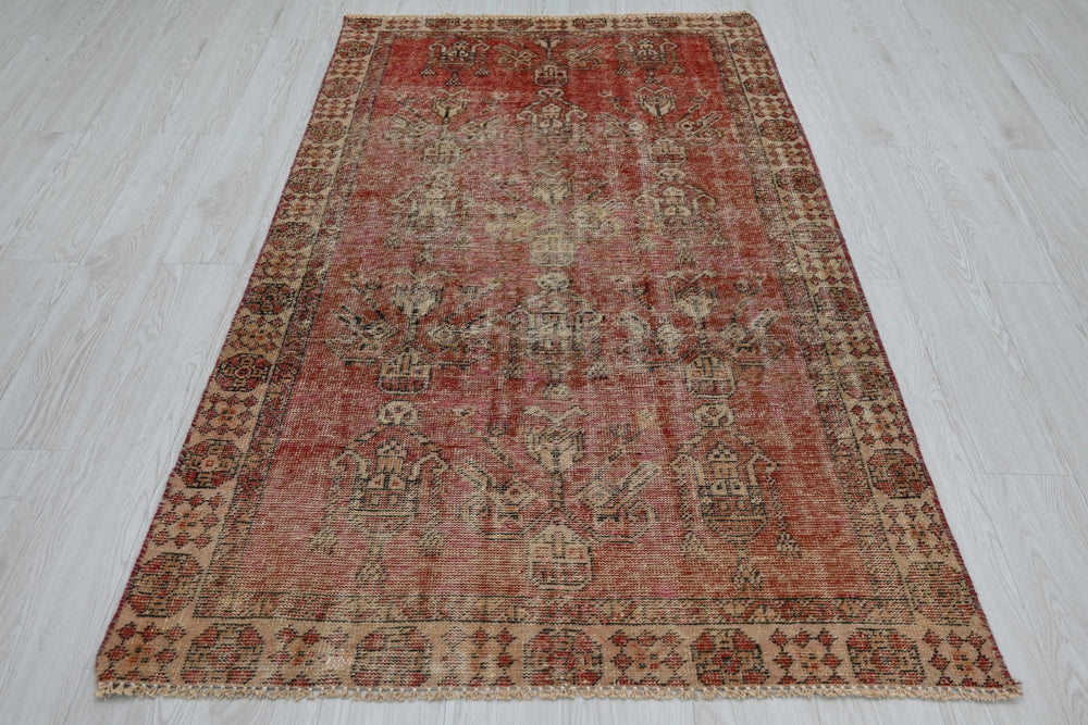 red Accent rug 3' 7" x 3' 10"
