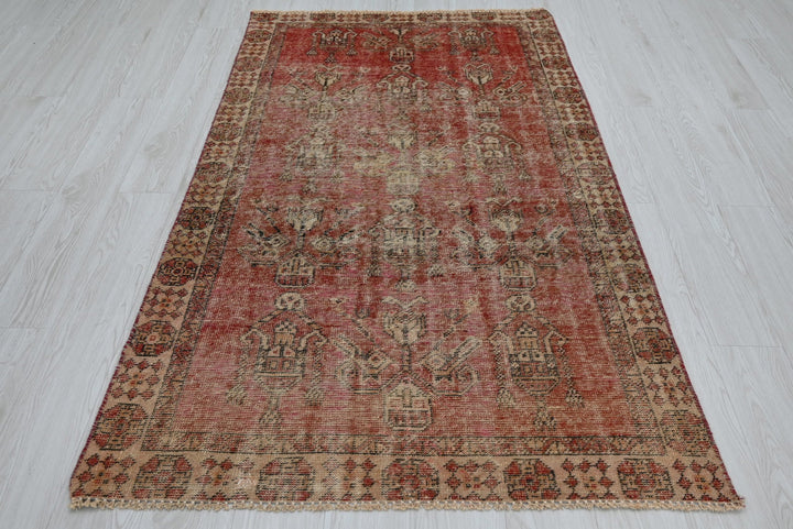 red Accent rug 3' 7" x 3' 10"