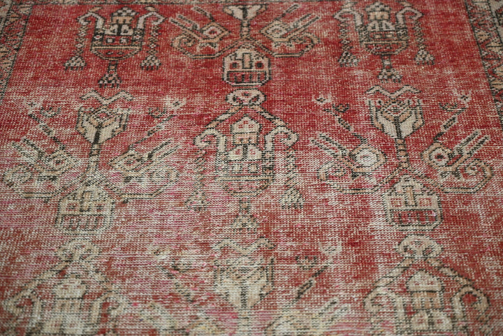 red Accent rug 3' 7" x 3' 10"