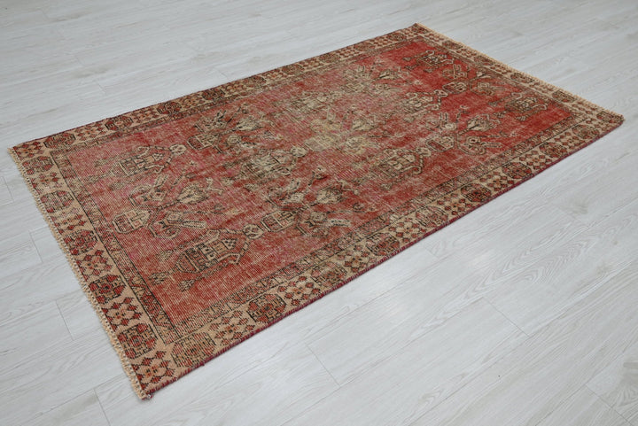 red Accent rug 3' 7" x 3' 10"