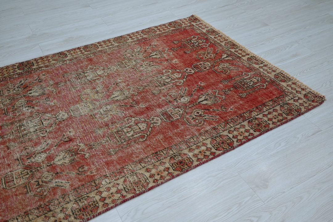 red Accent rug 3' 7" x 3' 10"