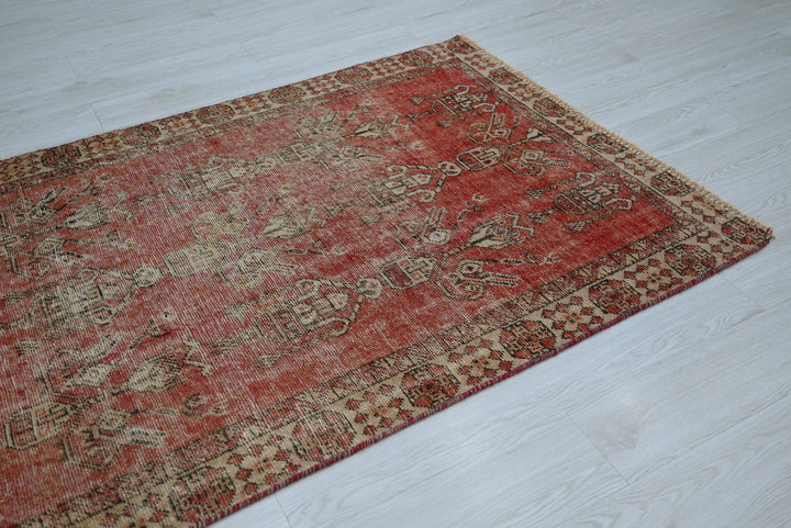 red Accent rug 3' 7" x 3' 10"