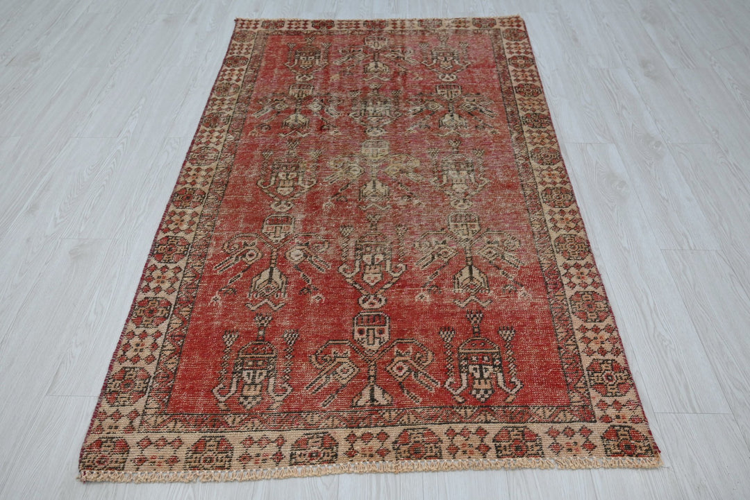 red Accent rug 3' 7" x 3' 10"