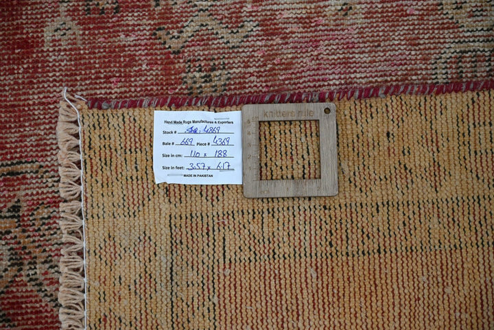 red Accent rug 3' 7" x 3' 10"