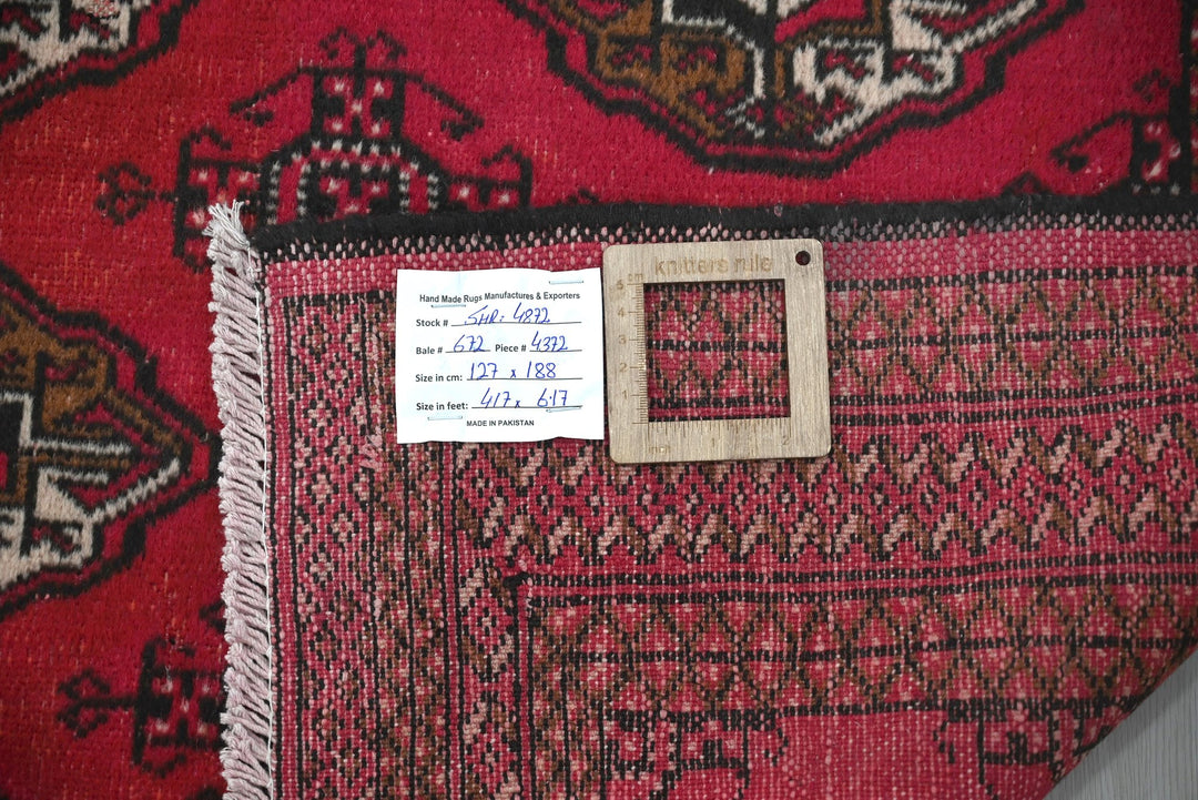red Accent rug 4' 2" x 6' 2"