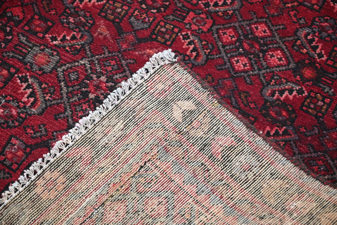 red Medium rug 4' 2" x 8' 8"