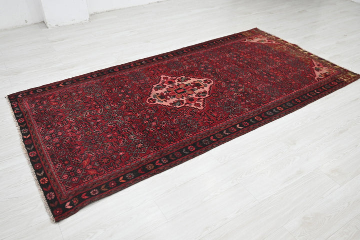 red Medium rug 4' 2" x 8' 8"