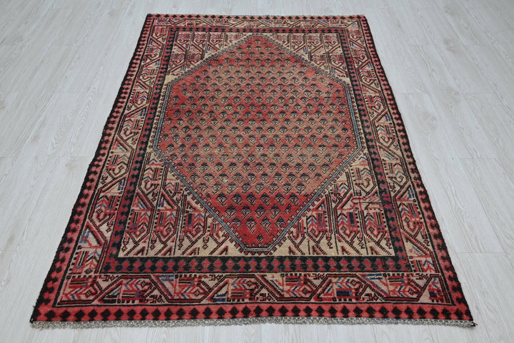 red Accent rug 4' 0" x 6' 5"