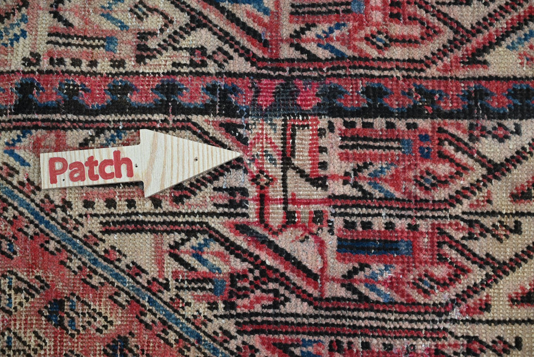 red Accent rug 4' 0" x 6' 5"