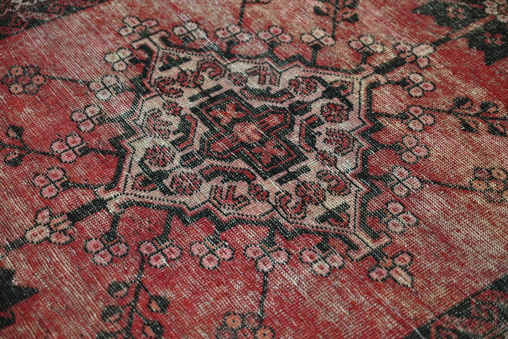 red Accent rug 3' 7" x 6' 3"