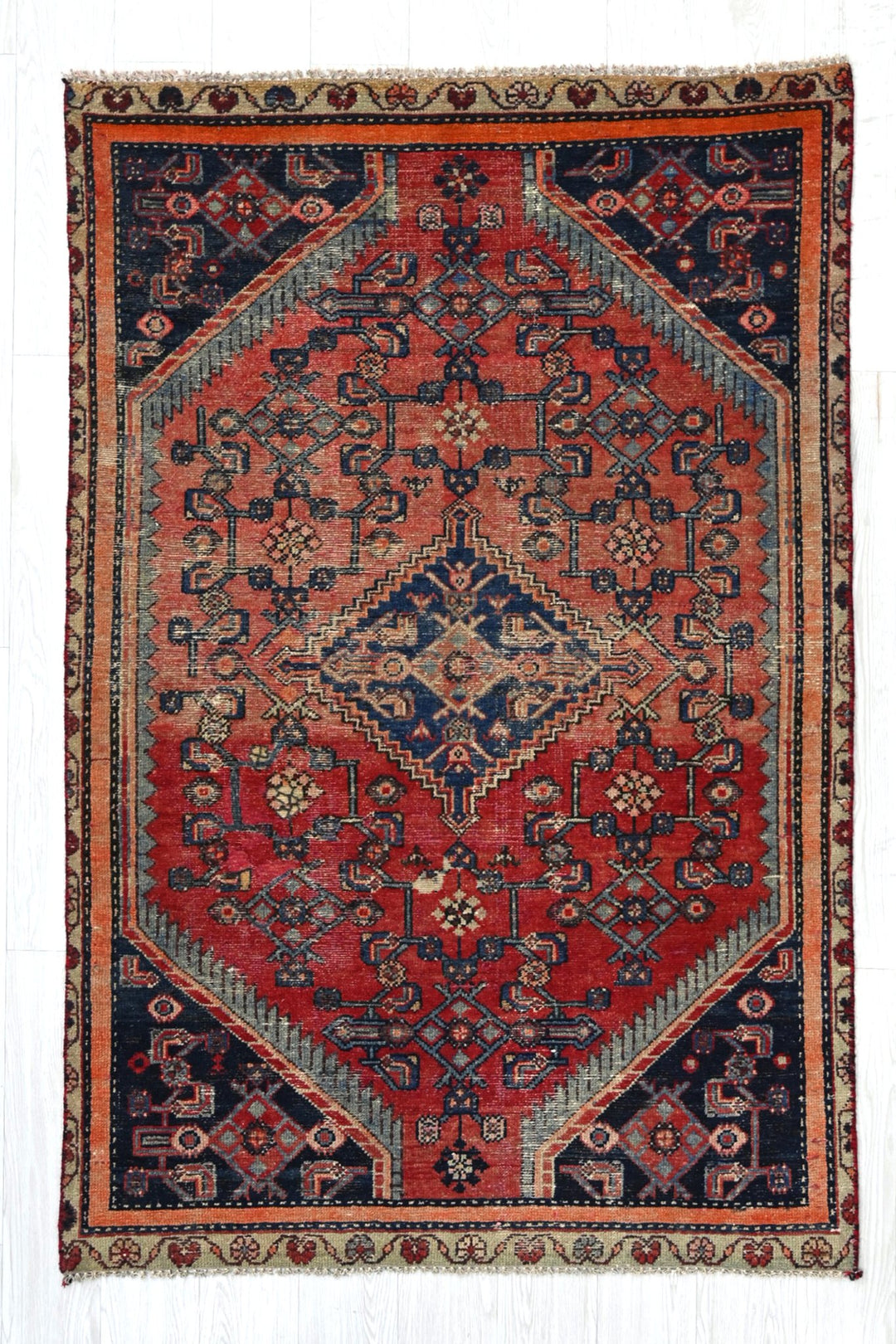 red Accent rug 4' 0" x 5' 11"