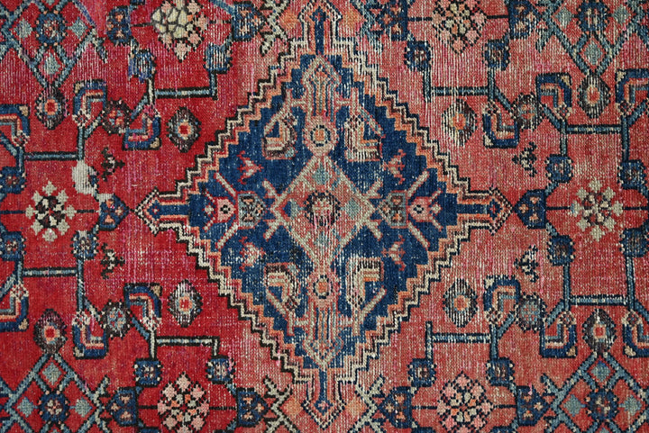 red Accent rug 4' 0" x 5' 11"