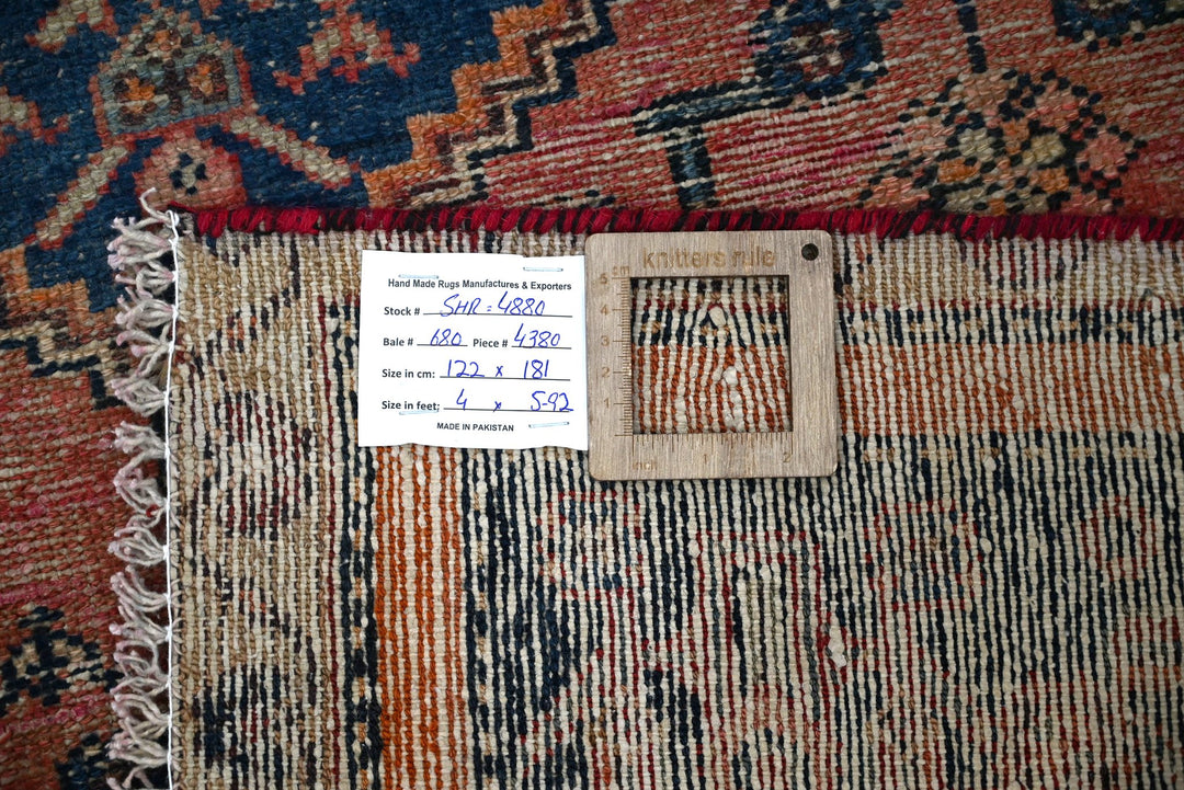 red Accent rug 4' 0" x 5' 11"