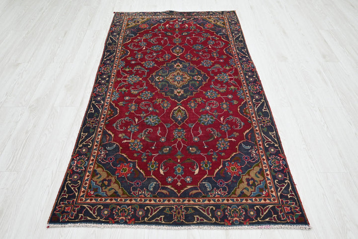 red Accent rug 3' 5" x 6' 4"