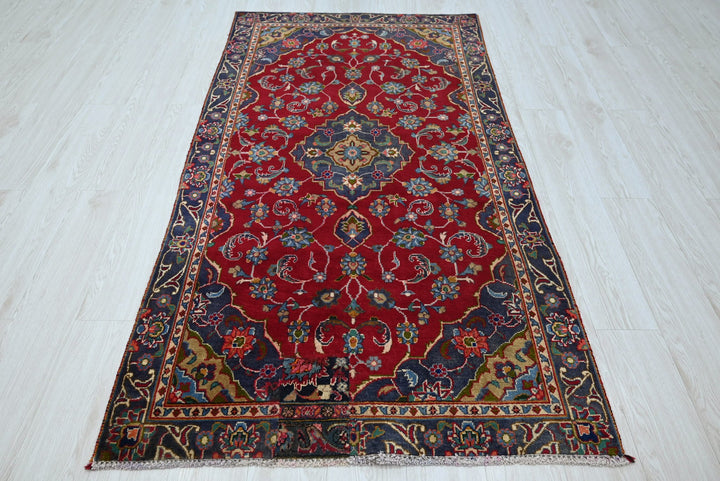 red Accent rug 3' 5" x 6' 4"