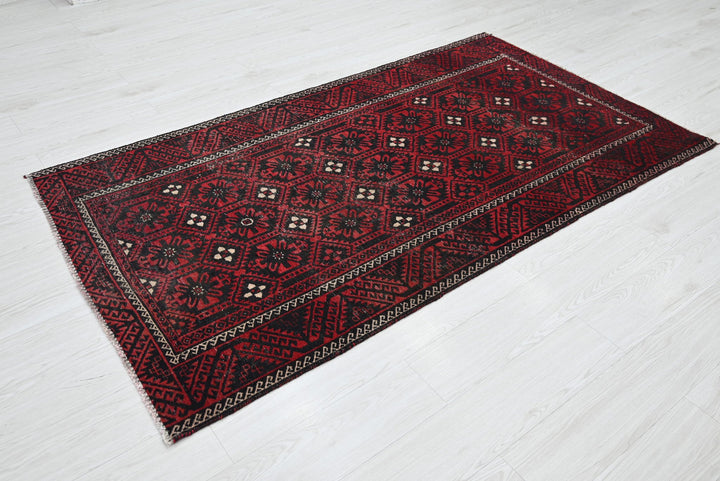 red Medium rug 3' 9" x 6' 11"