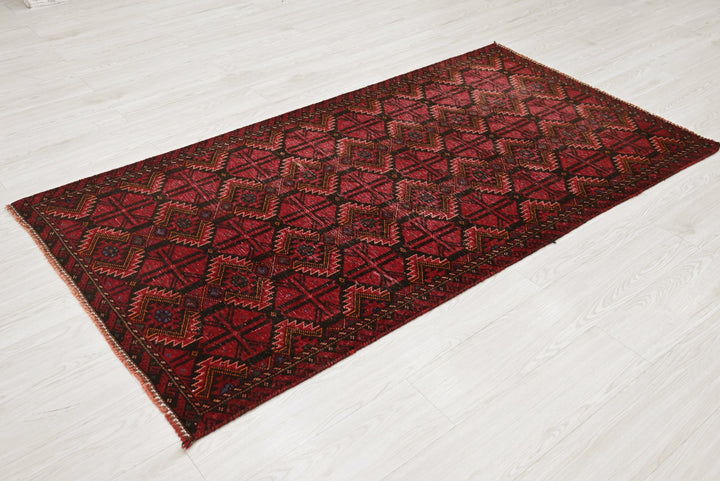 red Accent rug 3' 3" x 6' 3"
