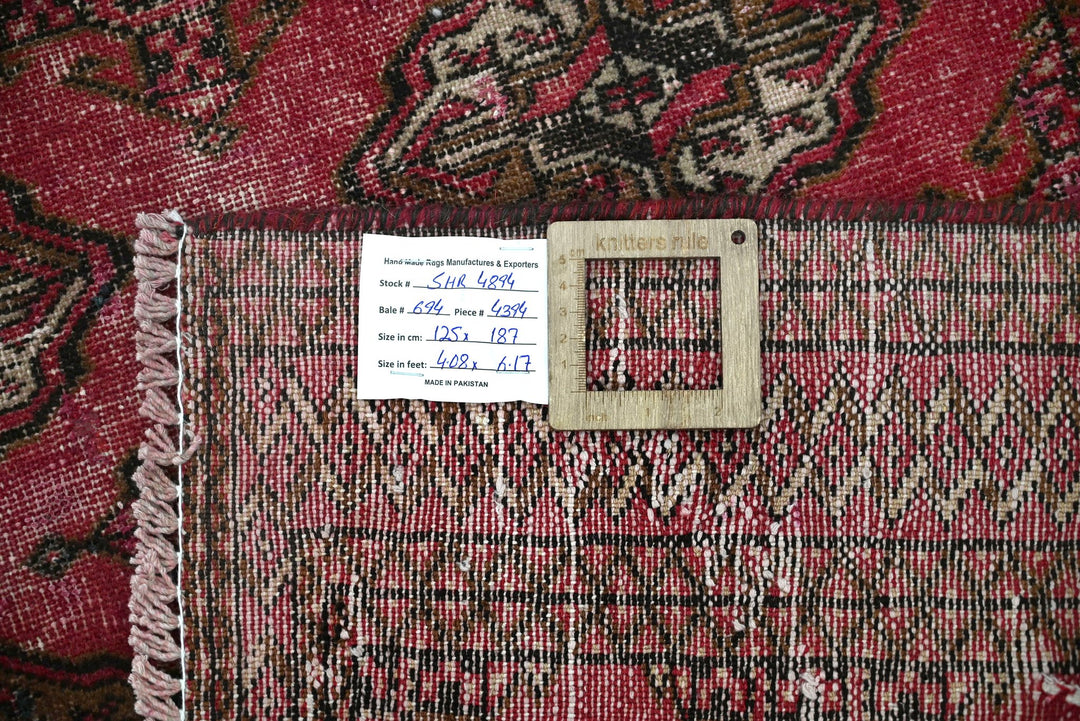 red Accent rug 4' 1" x 6' 2"