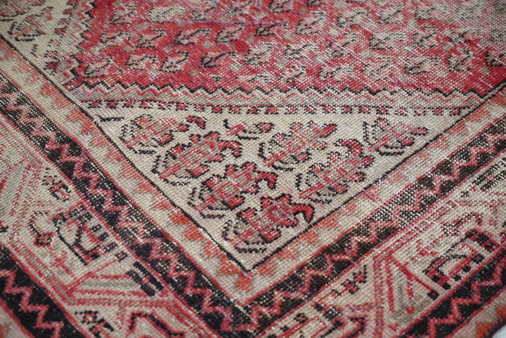 red Accent rug 4' 0" x 6' 4"