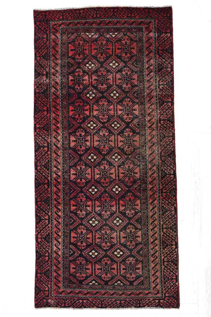 red Medium rug 3' 8" x 7' 10"