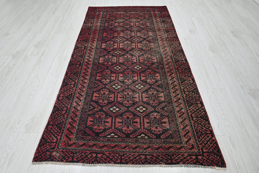 red Medium rug 3' 8" x 7' 10"