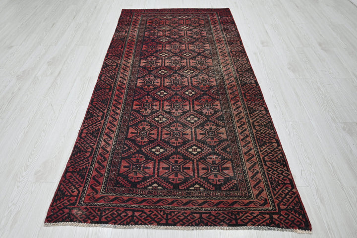 red Medium rug 3' 8" x 7' 10"
