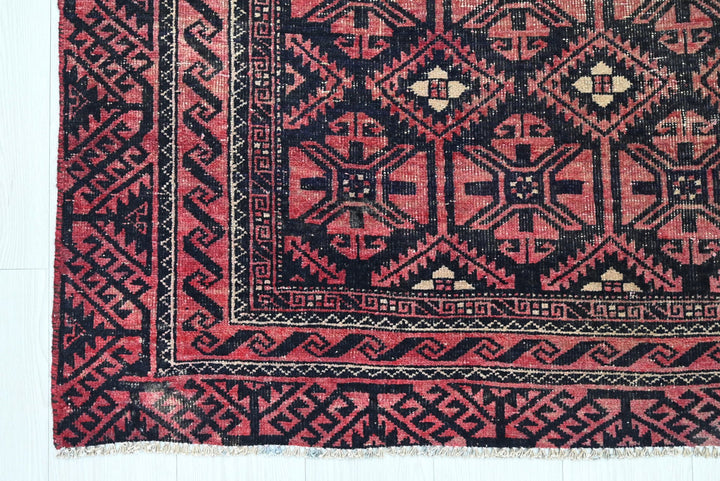 red Medium rug 3' 8" x 7' 10"