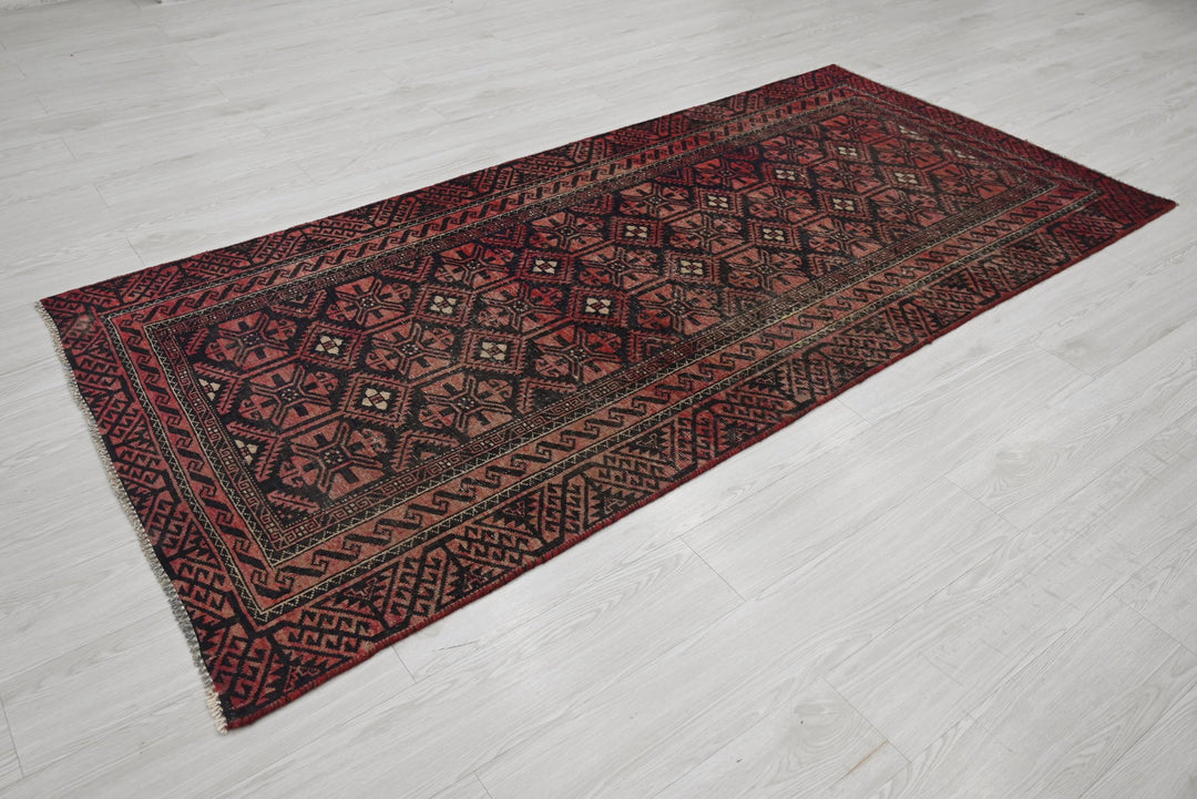 red Medium rug 3' 8" x 7' 10"