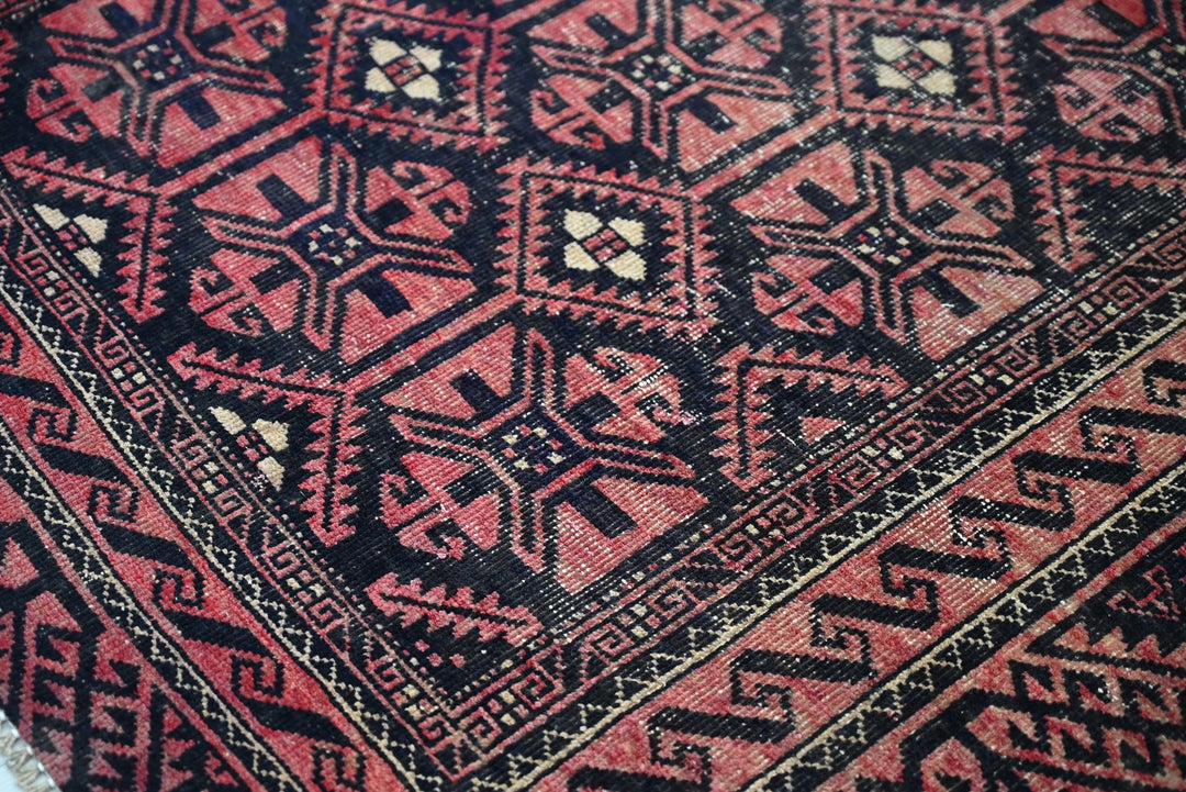 red Medium rug 3' 8" x 7' 10"