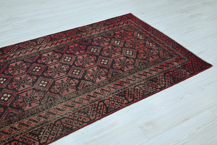 red Medium rug 3' 8" x 7' 10"