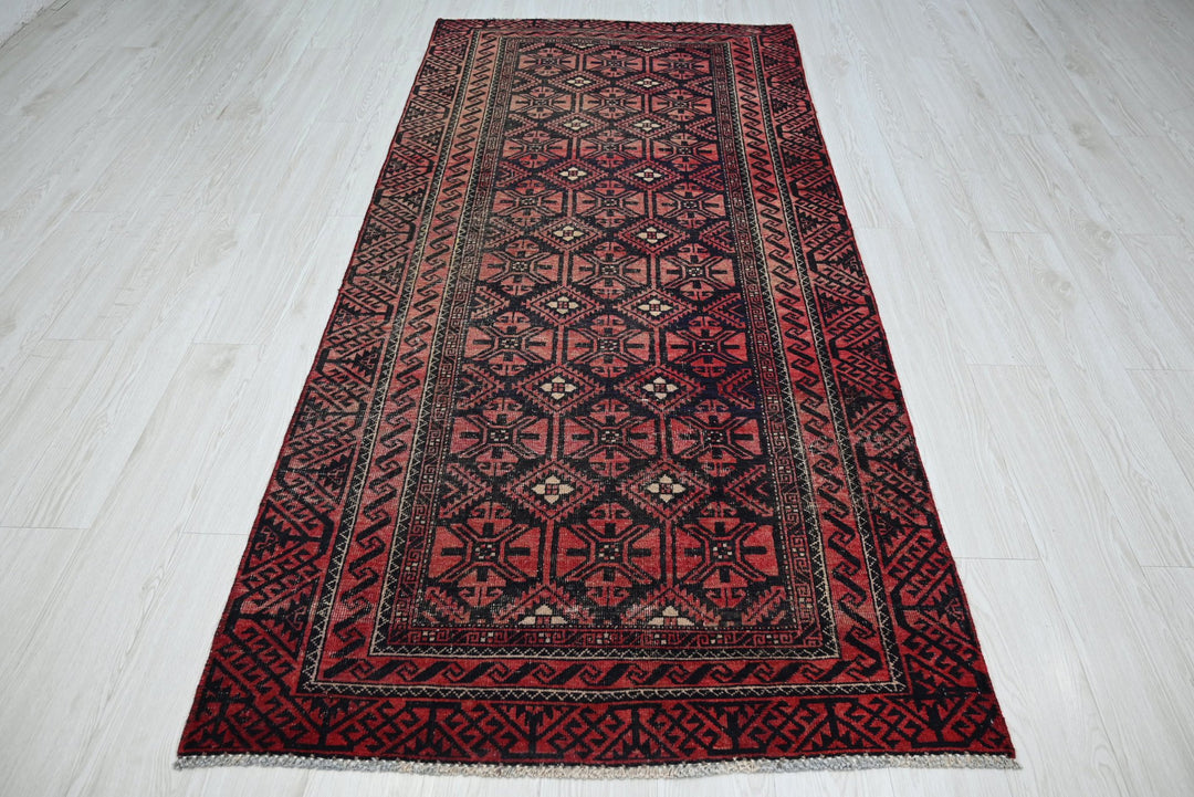 red Medium rug 3' 8" x 7' 10"