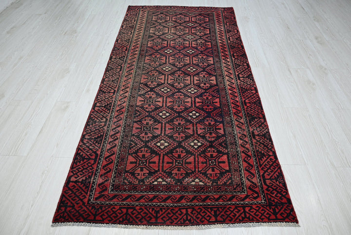 red Medium rug 3' 8" x 7' 10"