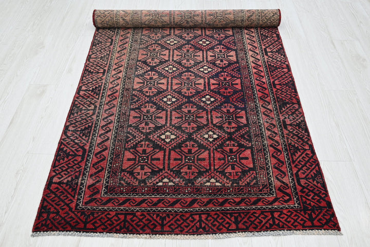 red Medium rug 3' 8" x 7' 10"