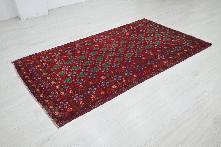 red Medium rug 3' 10" x 6' 10"
