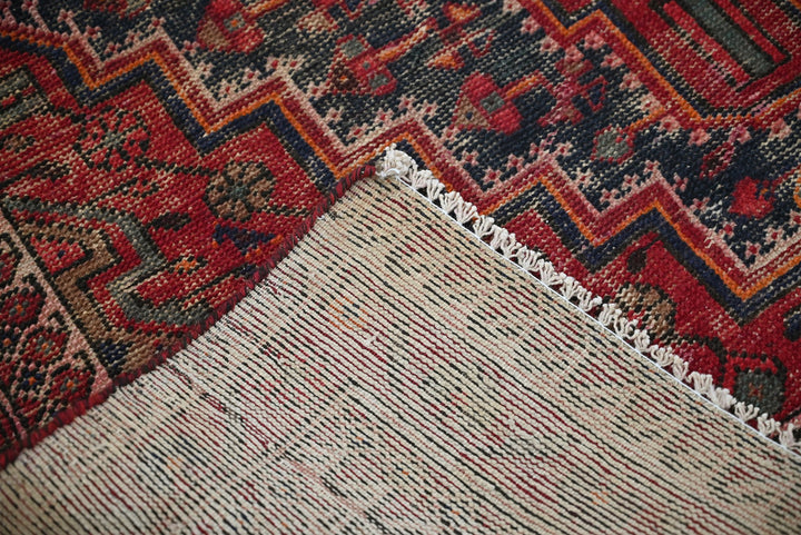 red Accent rug 4' 2" x 6' 6"