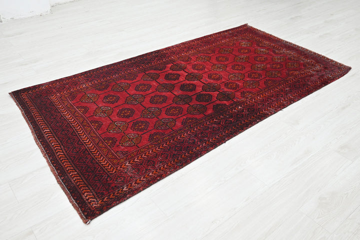 red Medium rug 3' 9" x 7' 0"