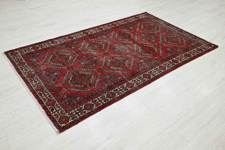 red Accent rug 3' 9" x 6' 5"