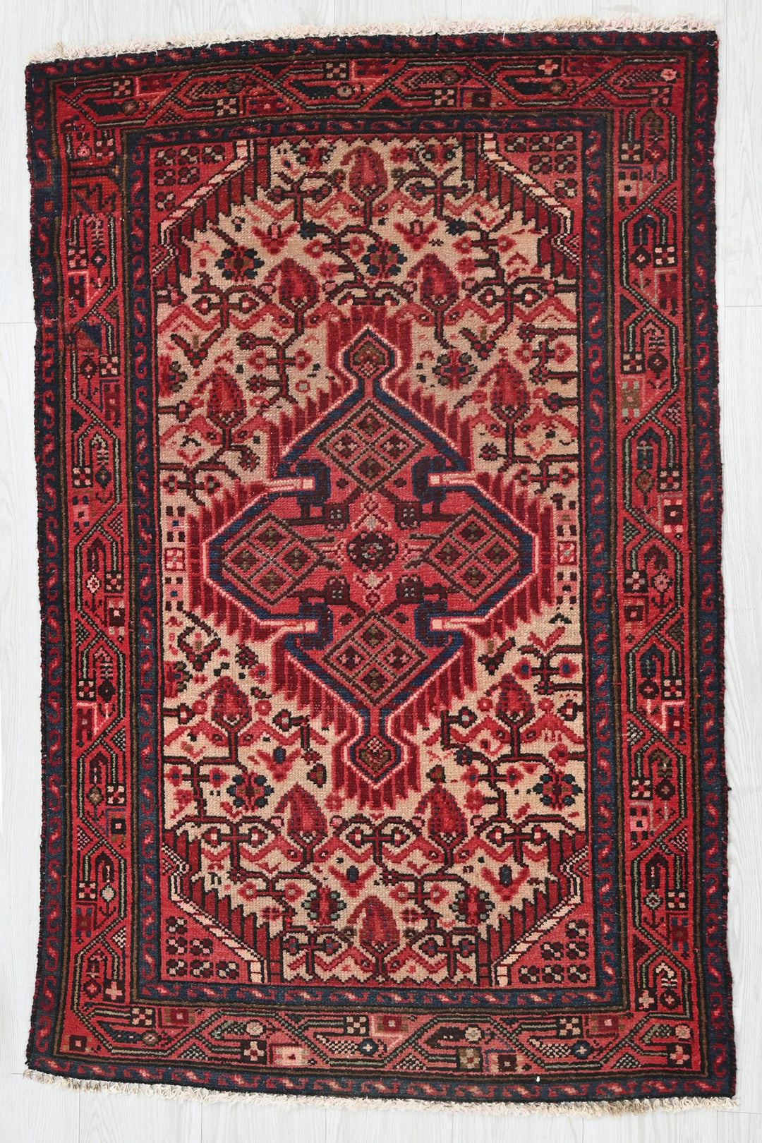 red Accent rug 2' 8" x 4' 1"