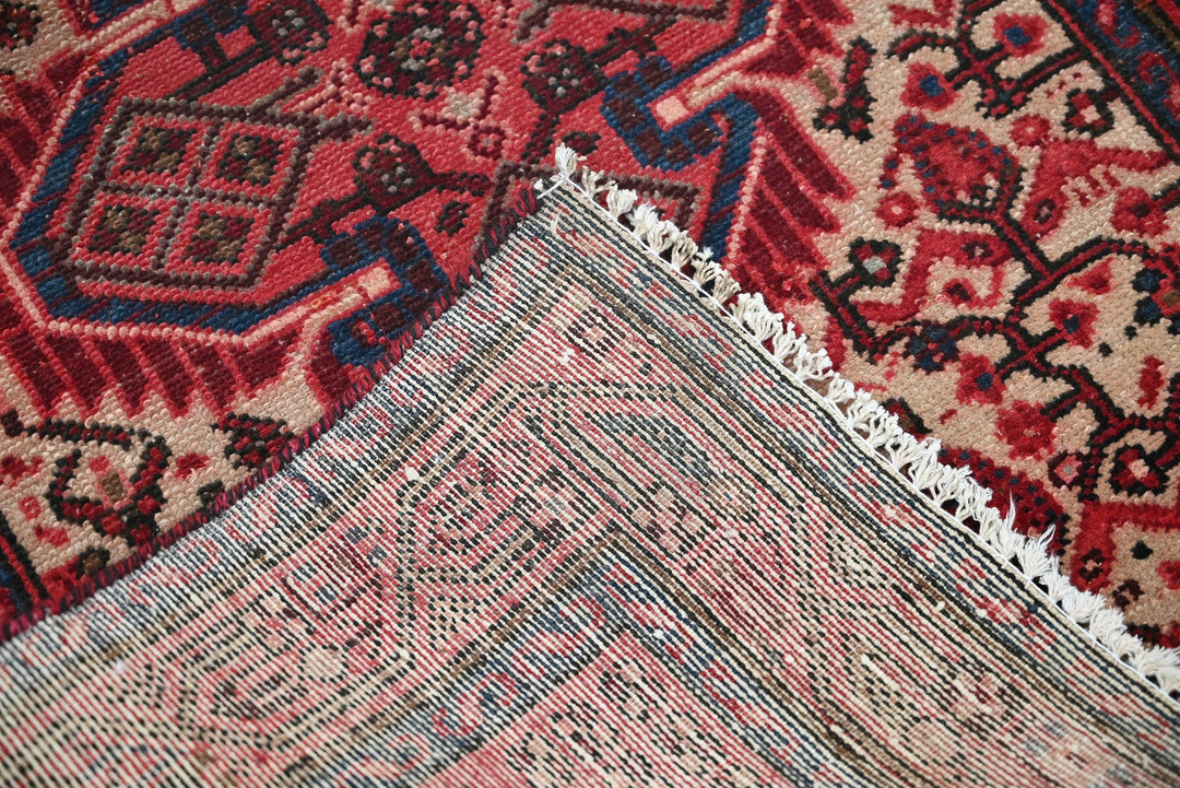 red Accent rug 2' 8" x 4' 1"