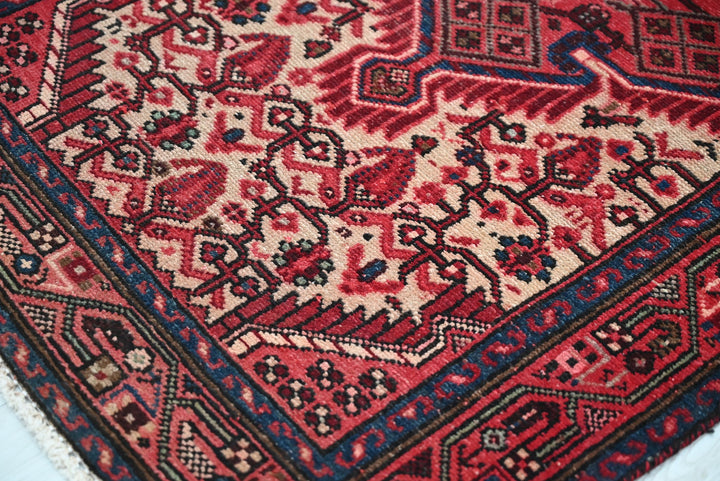 red Accent rug 2' 8" x 4' 1"
